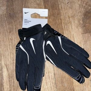 Black and white Nike Superbad Gloves